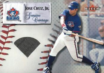 2000 Fleer Impact - Genuine Coverage Batting Gloves #NNO Jose Cruz, Jr. Front