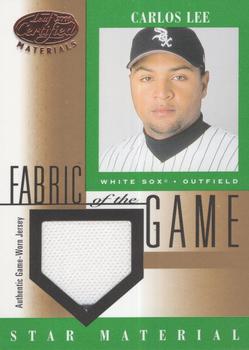 2001 Leaf Certified Materials - Fabric of the Game Base #FG-102 Carlos Lee  Front