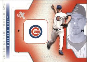 2002 Fleer E-X - Behind the Numbers #12 BN Kerry Wood  Front