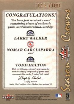 2002 Fleer Triple Crown - Season Crowns Triple Swatch #NNO Larry Walker / Nomar Garciaparra / Todd Helton  Back