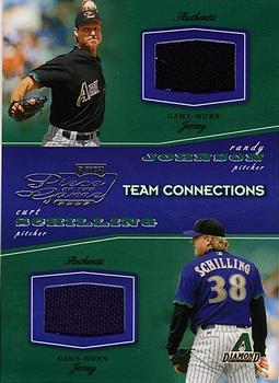 2002 Playoff Piece of the Game - Materials #POG-92 Randy Johnson / Curt Schilling Front