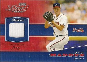 2002 Playoff Piece of the Game - Materials #POG-25 Greg Maddux Front