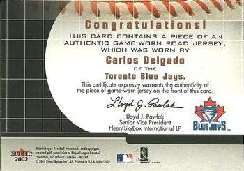 2002 Ultra - On the Road Game Jersey #NNO Carlos Delgado  Back