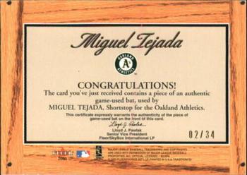 2003 Fleer Tradition - Lumber Company Game-Used Gold #NNO Miguel Tejada Back