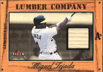 2003 Fleer Tradition - Lumber Company Game-Used Gold #NNO Miguel Tejada Front