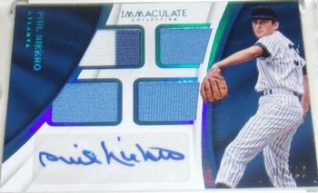 2017 Panini Immaculate Collection - Immaculate Quad Material Autographs Blue #QMA-PN Phil Niekro Front