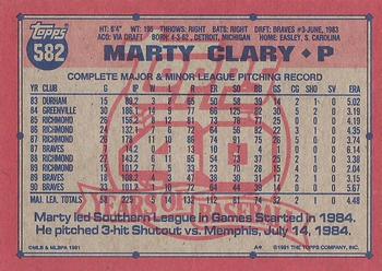 1991 Topps #582 Marty Clary Back