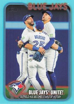 2024 Topps - Aqua #167 Blue Jays Unite!: Outfield Hug Becomes Staple of Victory Front