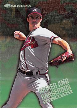 1997 Donruss - Armed and Dangerous #13 Greg Maddux Front