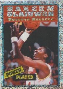 1995-96 Panini NBA Stickers (Brazil/Portuguese) #141 Hakeem Olajuwon Front