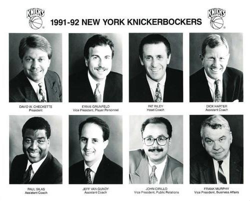 1991-92 New York Knicks Team Issue #NNO David Checketts / Ernie Grunfeld / Pat Riley / Dick Harter / Paul Silas / Jeff Van Gundy / Paul Cirillo / Frank Murphy Front