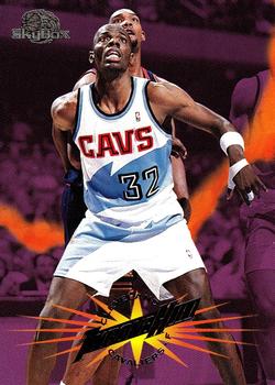 1995-96 SkyBox Premium #20 Tyrone Hill Front