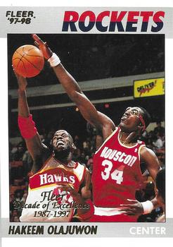 1997-98 Fleer - Decade of Excellence Rare Traditions #8 Hakeem Olajuwon Front