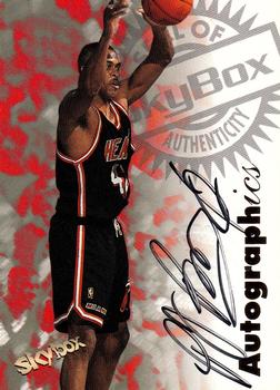 1997-98 SkyBox Premium - Autographics #NNO P.J. Brown Front