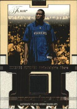 2001-02 Flair - Warming Up #NNO Dikembe Mutombo Front