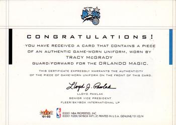 2001-02 Fleer Genuine - Coverage Plus #NNO Tracy McGrady Back