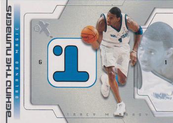 2003-04 E-X - Behind the Numbers #5 BTN Tracy McGrady Front