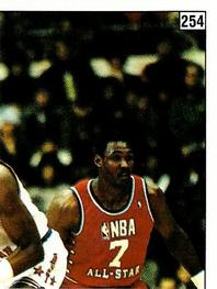 1988-89 Panini Stickers (Spanish) #254 Patrick Ewing / Akeem Olajuwon / Karl Malone Front