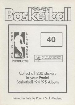1994-95 Panini Stickers #40 Tyrone Hill  Back
