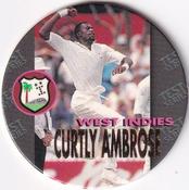 1995 Crown & Andrews Cricket Test Series & Sheffield Shield POG Pack Milk Caps - Gold Foil Parallel #C63 Curtly Ambrose Front