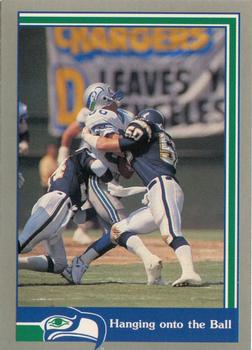 1989 Pacific Steve Largent #71 Hanging onto the Ball Front