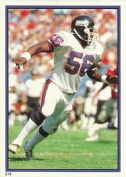 1985 Topps - Yearbooks Coming Soon Stickers #219 Lawrence Taylor Front