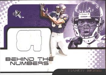 2001 Fleer E-X - Behind the Numbers #NNO Randy Moss Front