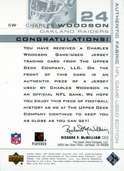 2001 SP Game Used Edition - Authentic Fabric #CW Charles Woodson Back