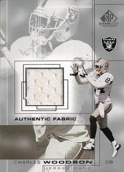 2001 SP Game Used Edition - Authentic Fabric #CW Charles Woodson Front