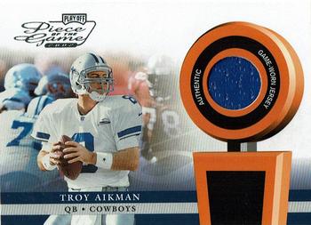 2002 Playoff Piece of the Game - Materials #POG-55 Troy Aikman Front