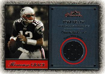 2004 Fleer Showcase - Showcase Grace Game-Used Material #SG-TB Tom Brady Front