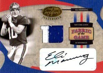 2005 Leaf Certified Materials - Fabric of the Game Team Logo #FG-18 Eli Manning Front