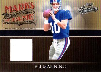 2006 Playoff Absolute Memorabilia - Marks of Fame Materials #MF-16 Eli Manning Front