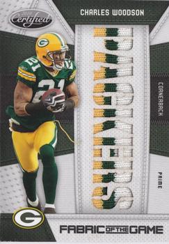 2010 Panini Certified - Fabric of the Game Team Die Cut Prime #27 Charles Woodson Front