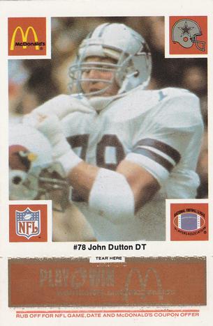 1986 McDonald's Dallas Cowboys - Full Game Pieces - Week 3 Gold/Orange Tab #NNO John Dutton Front