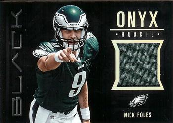 2012 Panini Black - Onyx Rookie Materials #18 Nick Foles Front