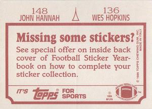 1986 Topps Stickers #136 / 148 Wes Hopkins / John Hannah Back