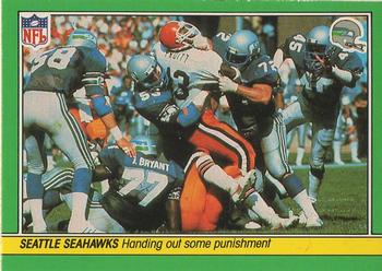 1984 Fleer Team Action #52 Handing Out Some Punishment Front