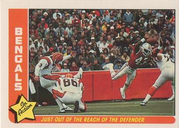 1985 Fleer Team Action #12 Just Out of the Reach of the Defender Front
