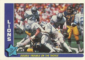 1985 Fleer Team Action #23 Double Trouble on the Tackle Front