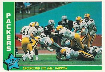 1985 Fleer Team Action #26 Encircling the Ball Carrier Front