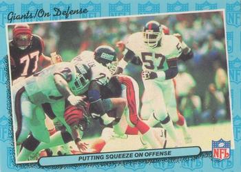 1986 Fleer Team Action #56 Putting Squeeze on Offense Front