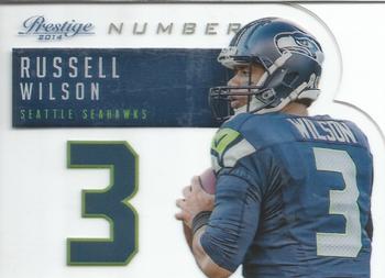 2014 Panini Prestige - Behind The Jersey Numbers #4 Russell Wilson Front