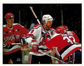 1988-89 Panini Hockey Stickers #165 Devils Skate Past Capitals Front