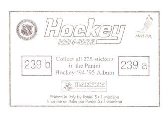 1994-95 Panini Stickers #239 50+ Logo / Mike Modano Back