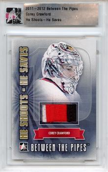 2011-12 In The Game Between The Pipes - He Shoots He Saves Special Memorabilia Cards #HSHS-28 Corey Crawford Front