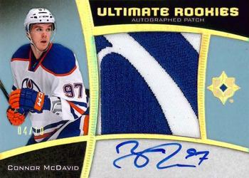 2015-16 Upper Deck Ultimate Collection - Ultimate Rookies - Spectrum Gold Auto Jumbo Patch #109 Connor McDavid Front