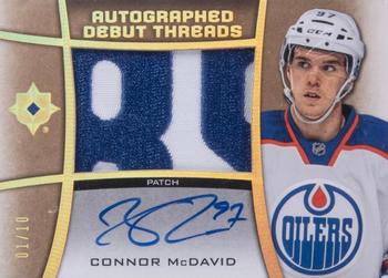 2015-16 Upper Deck Ultimate Collection - Debut Threads - Autographed Patch #ADT-CM Connor McDavid Front