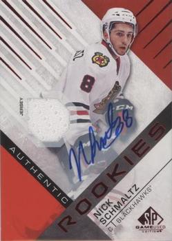 2016-17 SP Game Used - Red Autograph Material #104 Nick Schmaltz Front