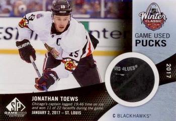 2017-18 SP Game Used - 2017 NHL Winter Classic Game Used Pucks #WCGUP-JT Jonathan Toews Front